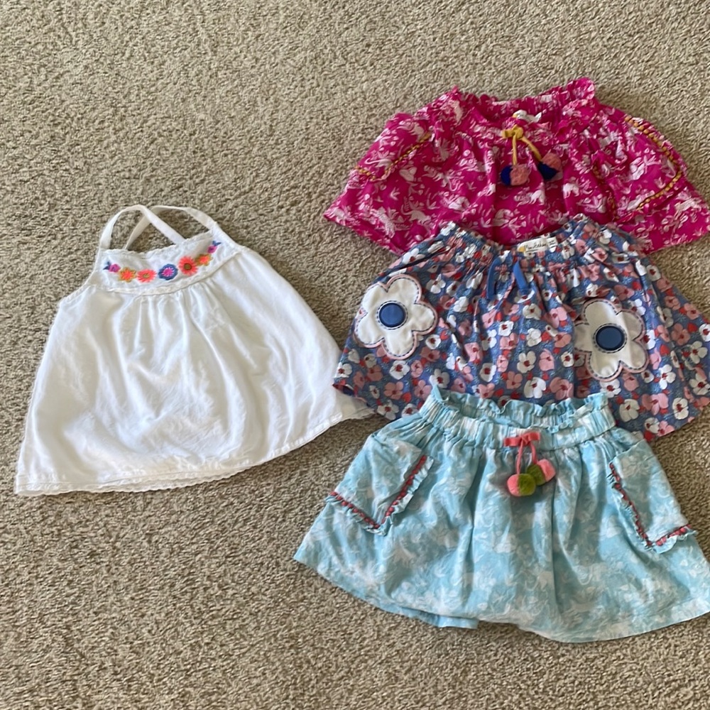 Cute bundle offering of 3 skirts and one summer tank.